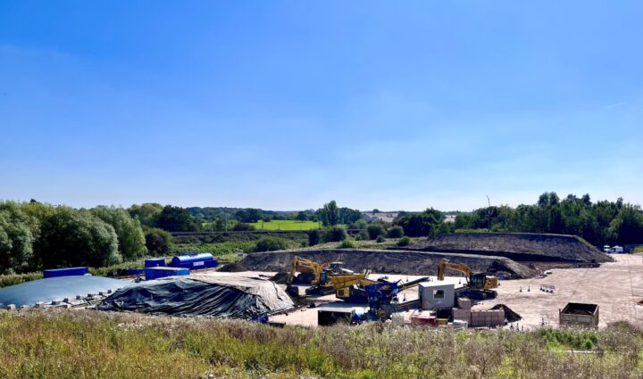 Treatment of asbestos in soils